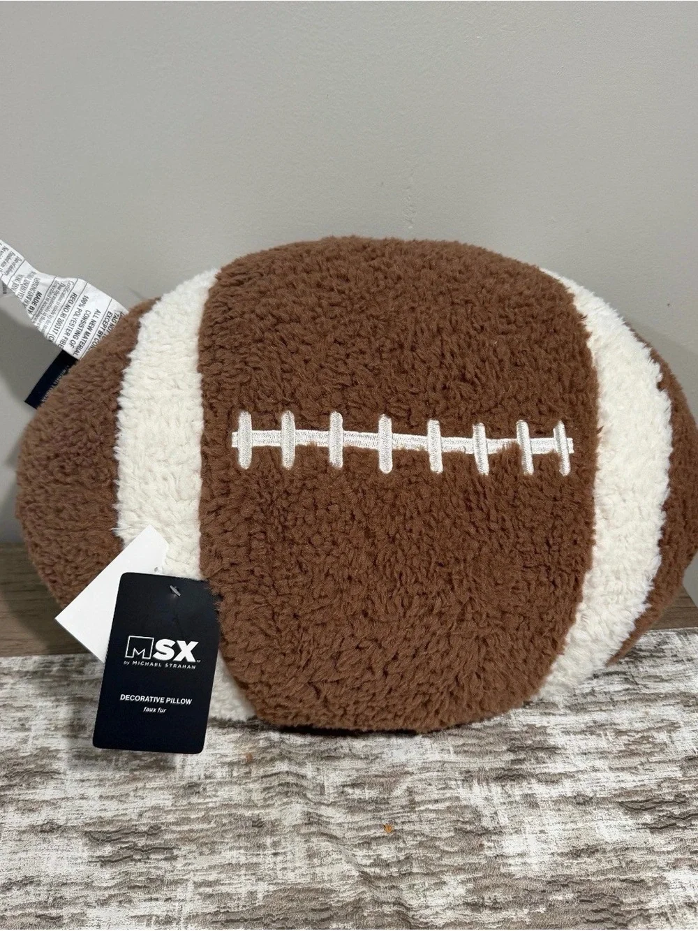 MSX Sherpa Football Accent Pillow in Brown and Cream